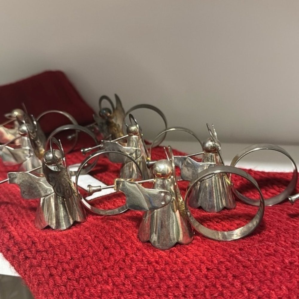 Set of 8 vintage silverplated on brass angel napkin rings